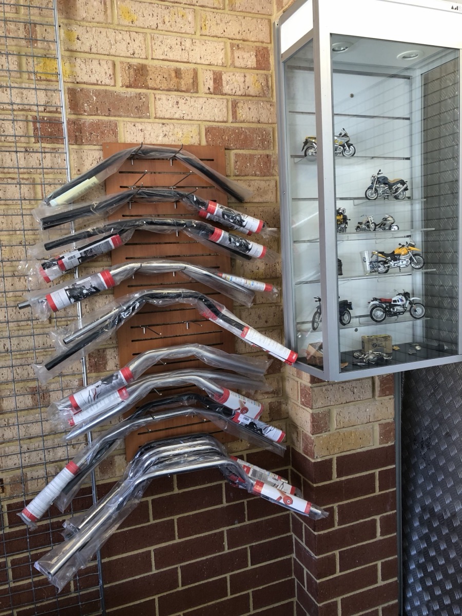 A rack of Lucas handlebars in the Munich Motorcycles showroom