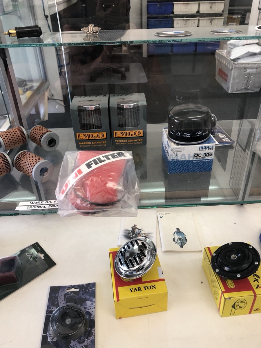 Mahle oil filters and air filters in the display cabinet at Munich Motorcycles